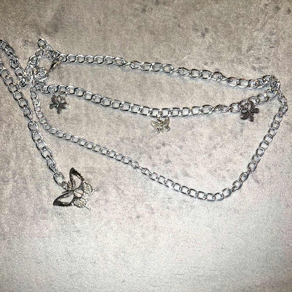 Silver skull butterfly belt and gold belt loop chain